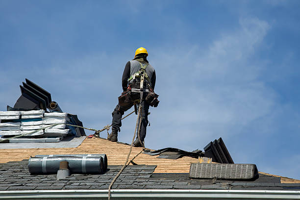 Professional Roofing technician working in Westwood, KS